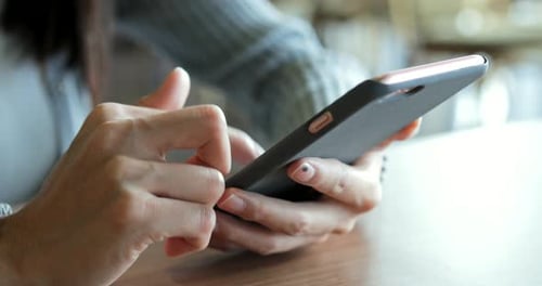 Close up of using mobile phone