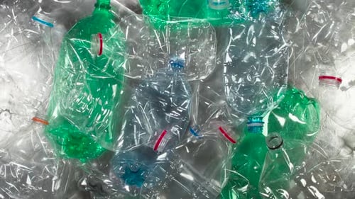 Pile of Crushed Plastic Bottles for Recycling