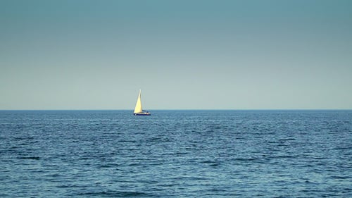 The Yacht is Under Sail Floats in the Sea