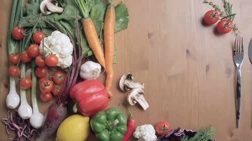 Fresh Vegetables with Herbs on Wooden Table