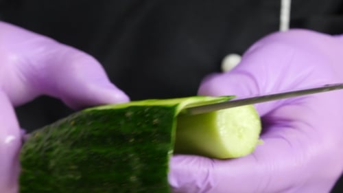 Master Prepares The Cucumber For Decoration.