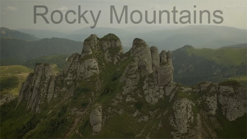 Picturesque Mountain Range Aerial View on Sunny Day