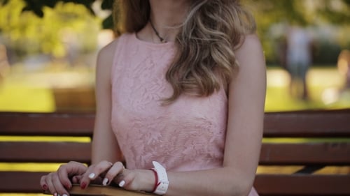 Delicious Girl Looks Into The Distance And Smiling