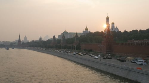Car Traffic On Moscow River Embankment In Summer Sunset