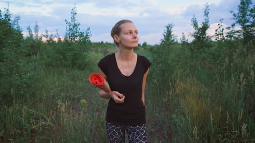 Inspired Woman Walking At a Field.