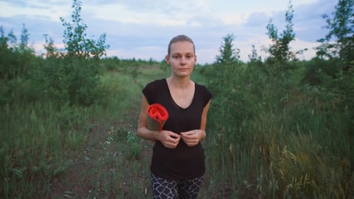 Inspired Woman Walking At a Field.