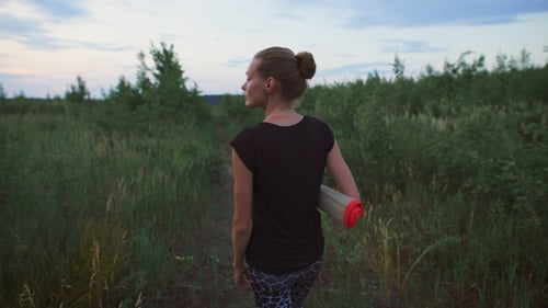 Inspired Woman Walking At a Field.