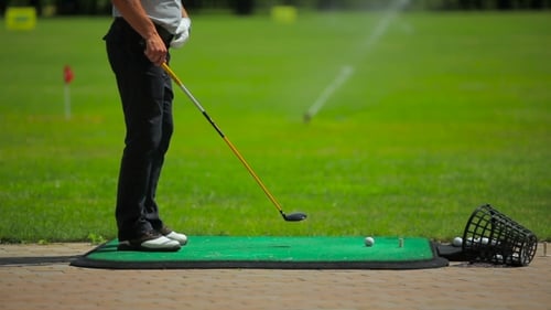 A Club Hit The Ball Twice Near The Golf Field