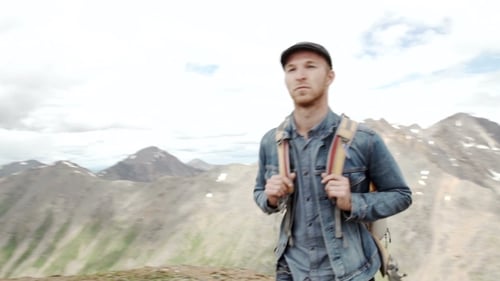 Man Hiking a Mountain, Scenic Wilderness View