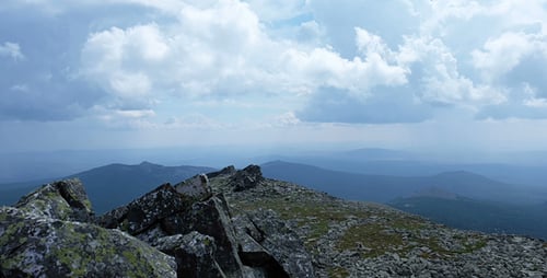 Clouds at Peak of Mountain
