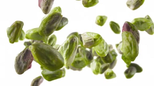 Flying of Peeled Pistachios in White Background with Alpha Channel