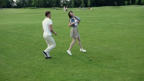 Happy Couple Running and Embracing in Green Park