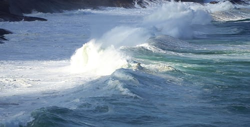 Ocean Waves Crashing on Rocky Shoreline