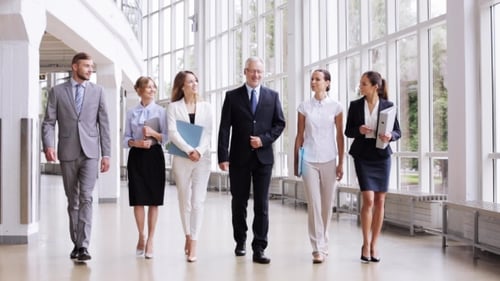 Business People Walking Along Office Building 3