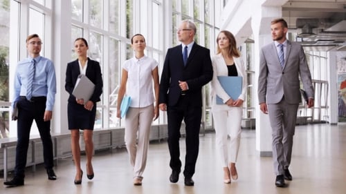 Business People Walking Along Office Building 6