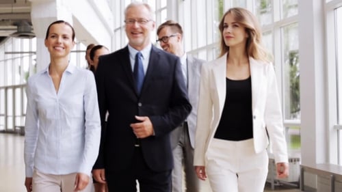 Business People Walking Along Office Building 62