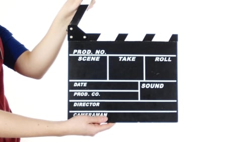 Girl Uses Movie Production Clapper Board, On White