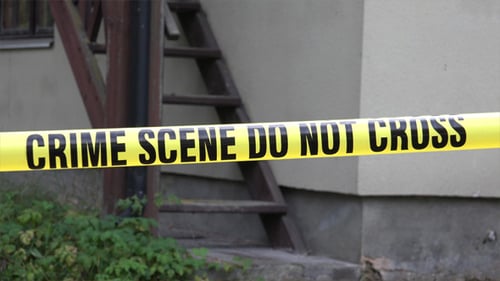 Crime Scene Tape Blocking Urban Building Access