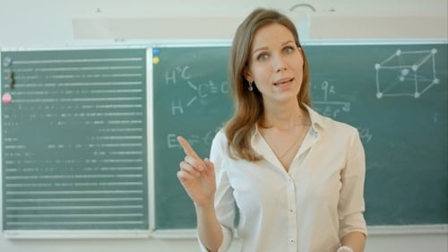 University Teacher Talking Into The Camera