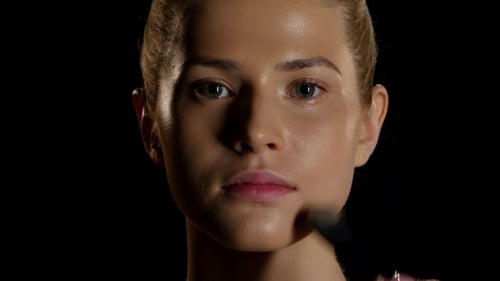 Foundation Applied to Woman's Face with Brush