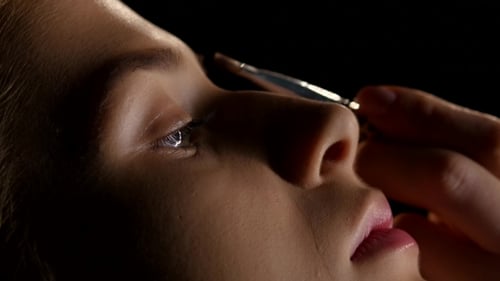 Professional Makeup. Paint The Eyebrows. Black.