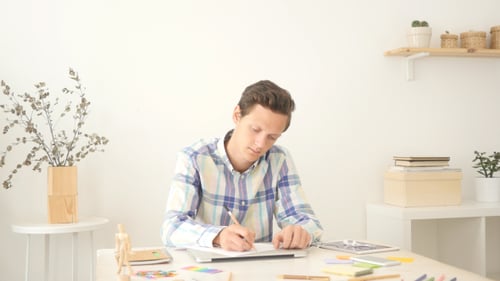 Writing on Paper in Modern Loft Office