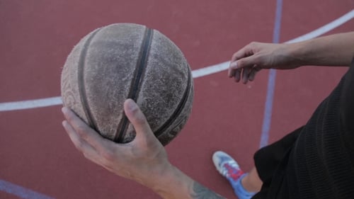 One Guy Play Basketball At District Sports Ground.