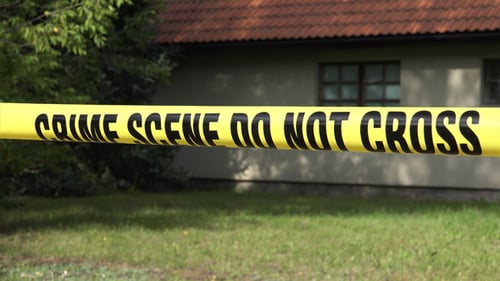 Crime Scene Tape in Front of House