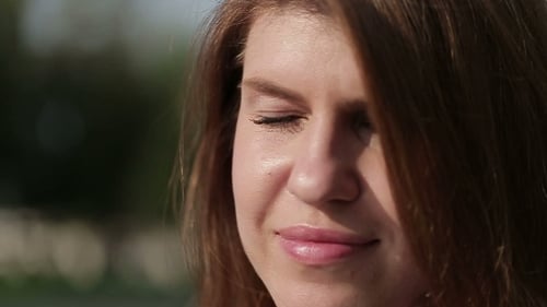 Close Up of Pretty Woman Smiling on Sunny Day