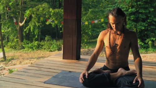 Man Meditating Outdoors