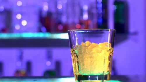 Bartender Is Making Cocktail At Bar Counter In Dark, Shots,