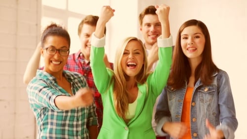 Students In School With Expression Of Triumph