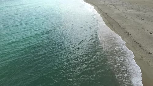 Aerial Drone View of Tropical Beach Ocean Waves Reaching Shore