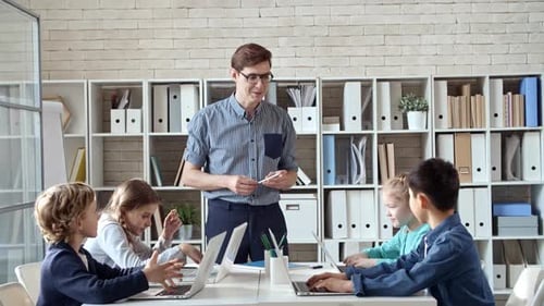 Teacher Talking to Students