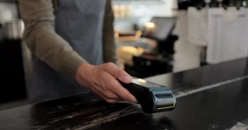 Close Up Customer Pay Using Credit Card Contactless Payment Spending Money in Cafe with Digital