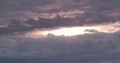 Sun Trying to Shine Through Dramatic Cloudscape