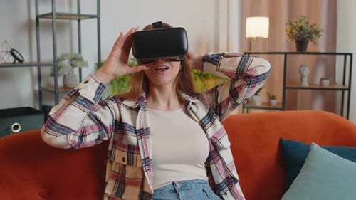Woman Using VR Headset in Living Room