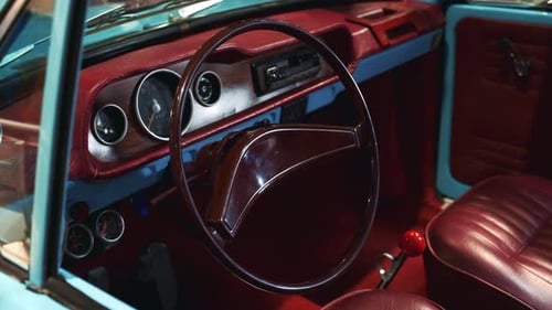 Classic Car Interior with Red Vinyl Bucket Seats
