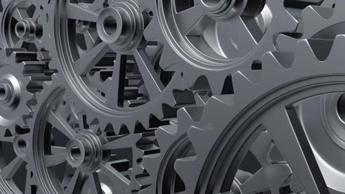 Seamless Loop of Interlocking Silver 3D Gears Turning