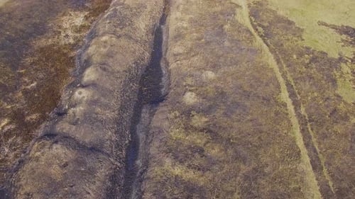 Aerial View of Burnt Meadow After Burning Caused By Drought and Climate Change
