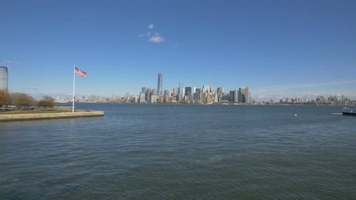 Scenic New York City Skyline with American Flag