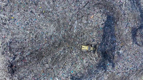 Birds Eye View of Landfill with Bulldozer