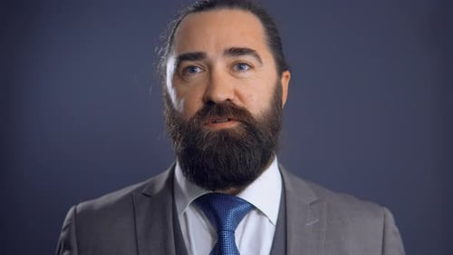 Man in Suit Looking at Camera