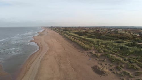 Aerial View Of Long Sandy Beach In The North Sea, South Holland, Netherlands Near Katwijk. Drone