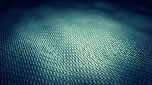 Animated Dark Blue Geometric Fabric Texture with Pulsing Light
