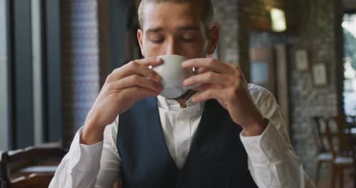 Young professional man in a cafe