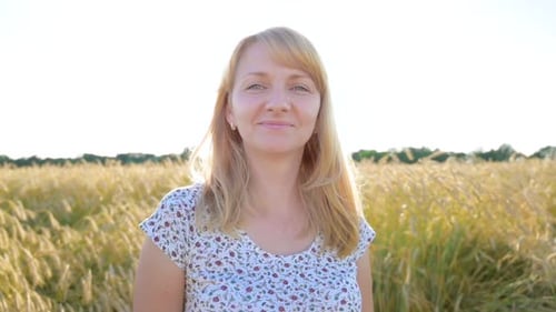 Portrait Woman on Wheat Field