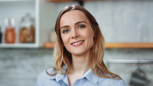 Close Up Face of Young Smiling Woman Posing Having Positive Emotion