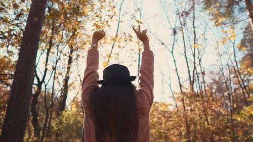 Free Girl in Woods Enjoying Day