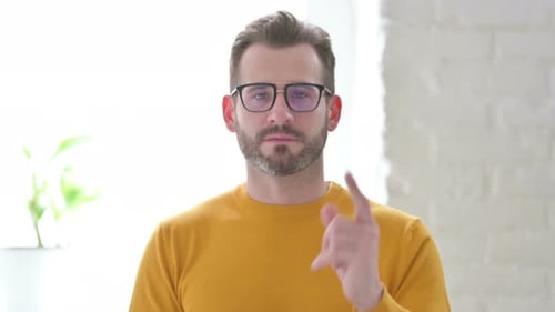 Man With Beard Speaks Directly to Camera